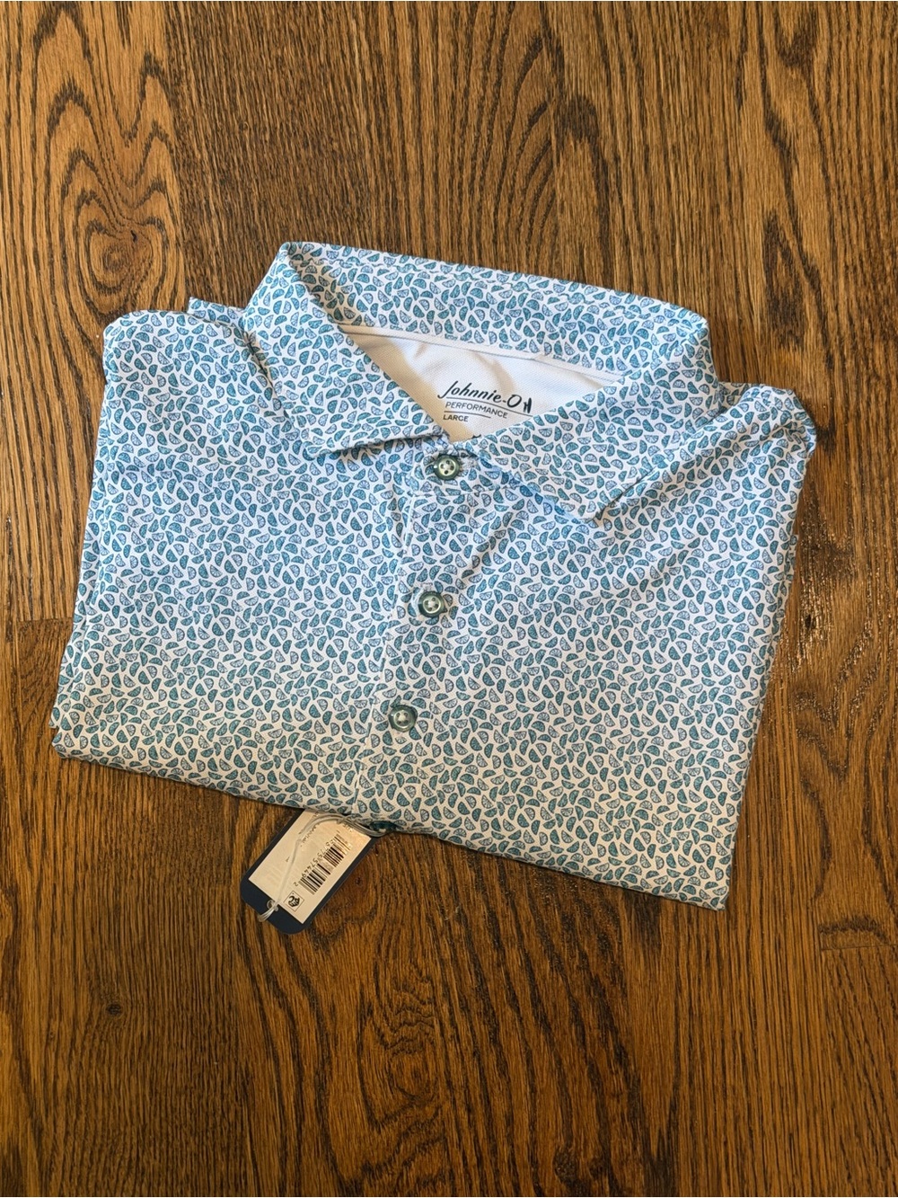 Jonny-O performance polo size Large NWT
Short sleeve 
Blue print